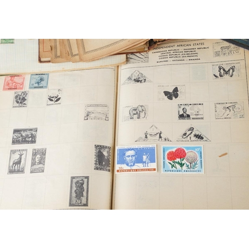 697 - A collection of various stamps to include some in albums and some loose to include sheets of Isle of... 