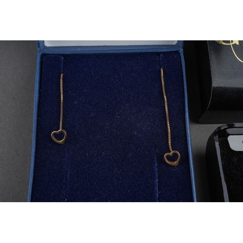 732 - A selection of yellow metal earrings. To include two pair of earrings and one odd earring. Approx le... 