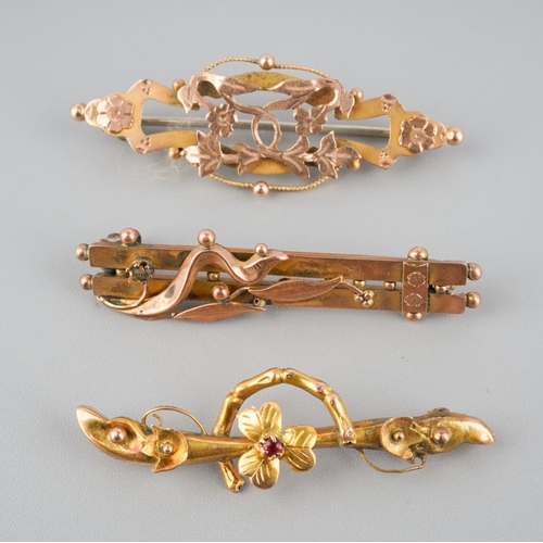 734 - A collection of three 9ct gold antique brooches. Each brooch with marks indicating 9ct gold, some br... 