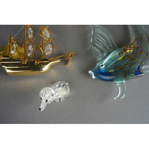 1000 - Eight Crystal Temptations by Swarovski 24k gold plated ornaments including vase of flowers, birds, p... 