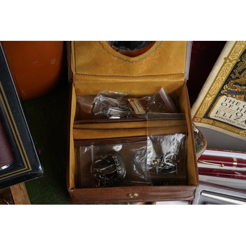 1019 - Assorted lot to include: vintage leather picnic case, various buttons, a Triumph Stamp Album includi... 