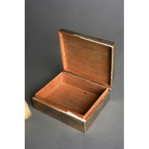 1028 - A pair of later Victorian silver mounted clothes brushes, chased with flowers and shell, hallmarked ... 