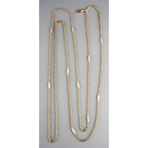 1062 - An antique long guard chain. The plain polished chain with trombone link spacers, to the lobster cla... 