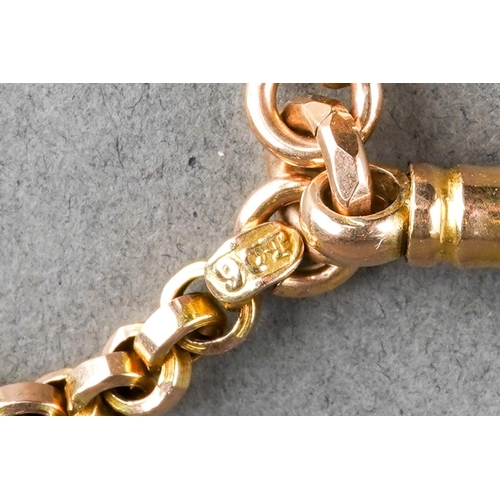1062 - An antique long guard chain. The plain polished chain with trombone link spacers, to the lobster cla... 