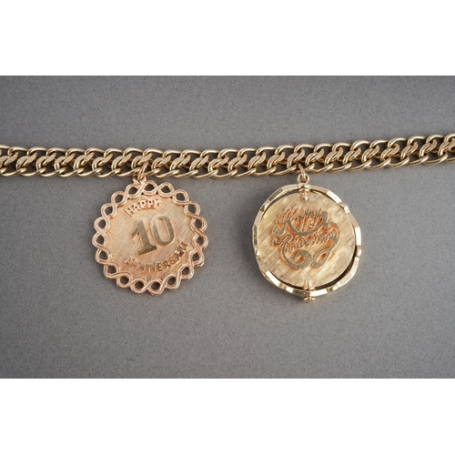 1070 - An American charm bracelet with charms attributed to Dankner. The solid fancy curb link chain suspen... 