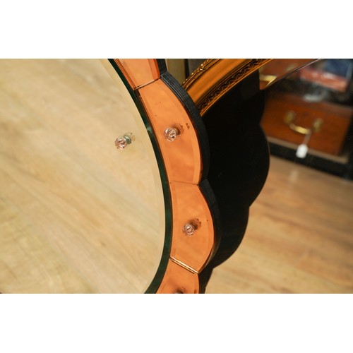 107 - Two Mirrors to include a Venian style mid 20th century round one (2)