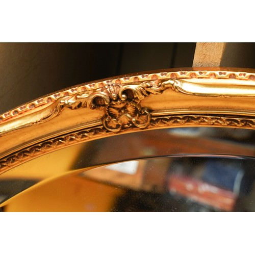 107 - Two Mirrors to include a Venian style mid 20th century round one (2)