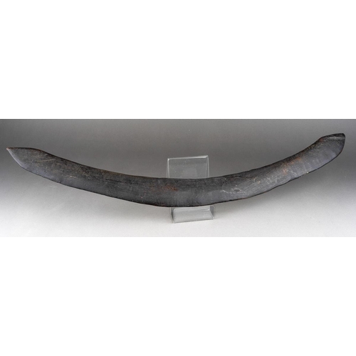 110 - Ethnographica -An Aboriginal boomerang, both ends with deep scratched marks, width 67cm x depth appr... 
