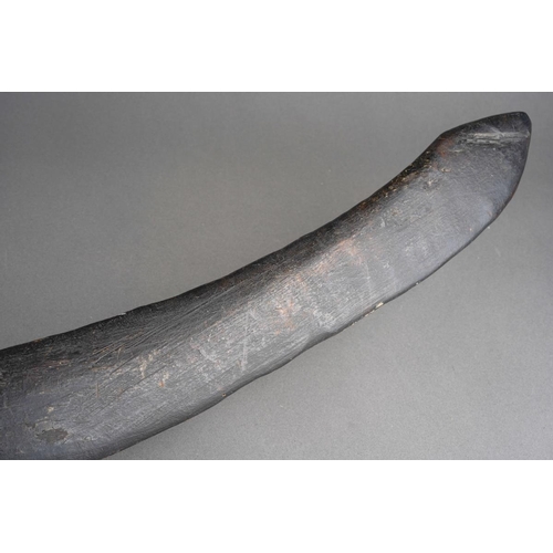 110 - Ethnographica -An Aboriginal boomerang, both ends with deep scratched marks, width 67cm x depth appr... 