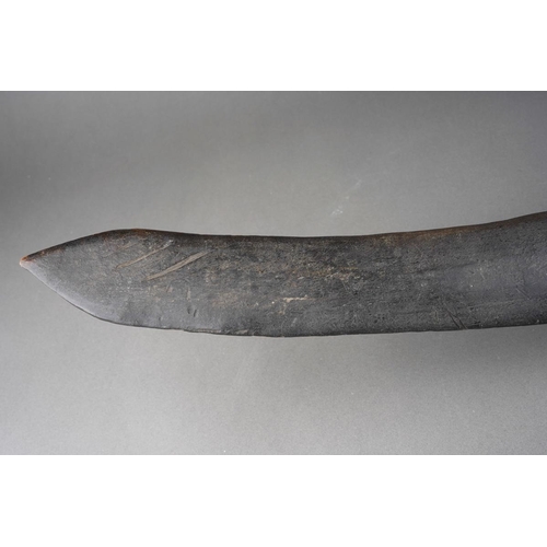 110 - Ethnographica -An Aboriginal boomerang, both ends with deep scratched marks, width 67cm x depth appr... 