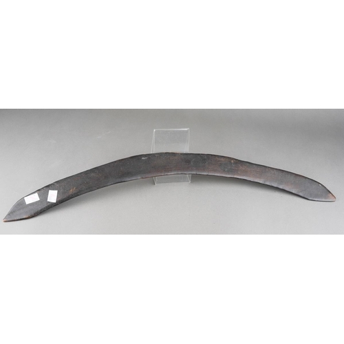 110 - Ethnographica -An Aboriginal boomerang, both ends with deep scratched marks, width 67cm x depth appr... 