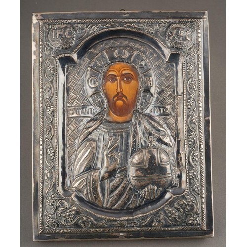 197 - A 20th century Russian icon of rectangular form, the embossed white metal front stamped 900 to top a... 