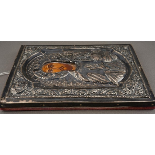 197 - A 20th century Russian icon of rectangular form, the embossed white metal front stamped 900 to top a... 