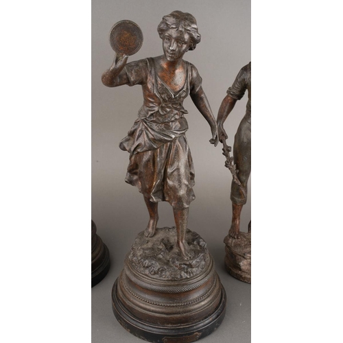 205 - After Rancoulet, a pair of spelter figures, a Lady holds a tamborine, the Man a bird [af] both on so... 