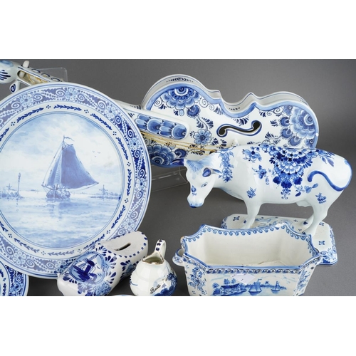 305 - A large collection of Delph ware to include a large violin, cow on base, plates, money bank, trinket... 