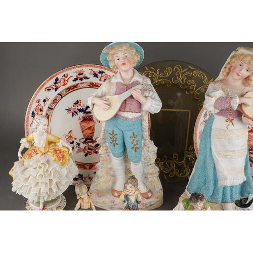 327 - A box of figural ceramics and other ceramics and glassware, including a pair of Heubach bisque figur... 