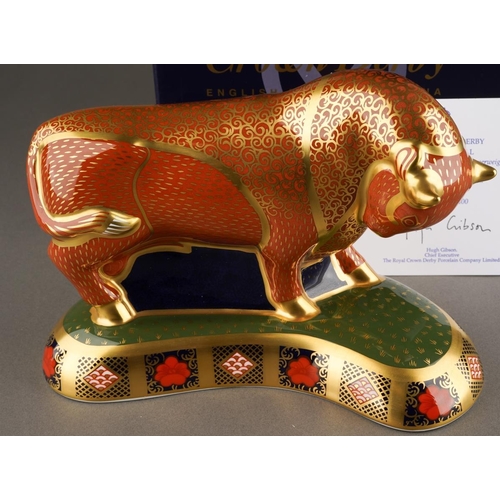 339 - A Royal Crown Derby limited edition 385/400 Harrods Bull paperweight, 21st Anniversary gold stopper,... 