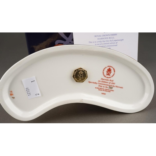 339 - A Royal Crown Derby limited edition 385/400 Harrods Bull paperweight, 21st Anniversary gold stopper,... 