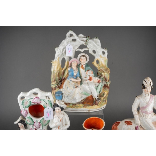 358 - A collection of seven Victorian Staffordshire pottery figures, comprising a cow by a stream (restore... 