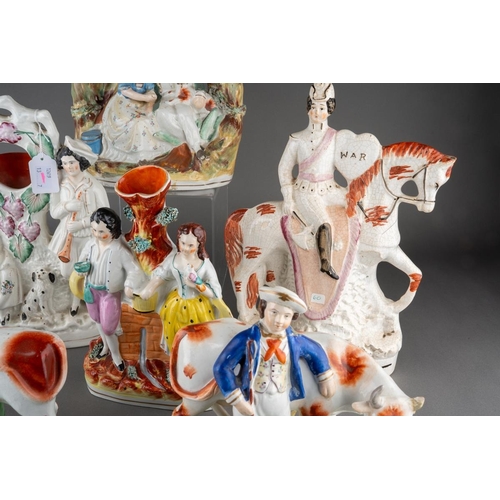 358 - A collection of seven Victorian Staffordshire pottery figures, comprising a cow by a stream (restore... 