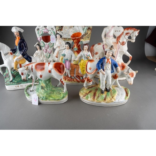 358 - A collection of seven Victorian Staffordshire pottery figures, comprising a cow by a stream (restore... 