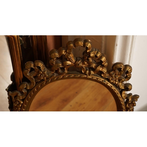 564 - Three modern gilt framed wall mirrors, the largest of arched form with inner gilt divisions, overall... 