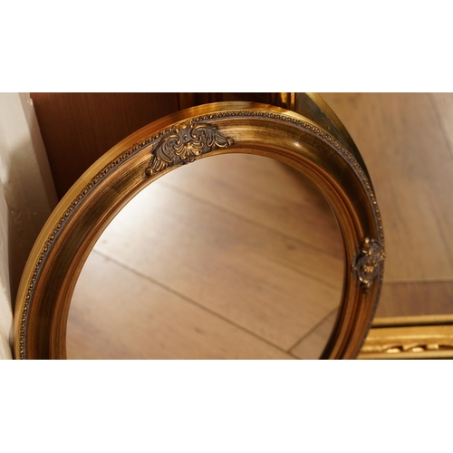 564 - Three modern gilt framed wall mirrors, the largest of arched form with inner gilt divisions, overall... 