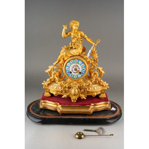 575 - A late 19th Century gilt metal figural mantel clock, with porcelain dial, Roman numerals,  Japy Frer... 