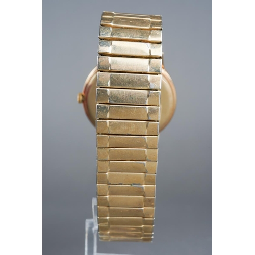 577 - A Longines mens 9ct gold watch with paperwork and in original box