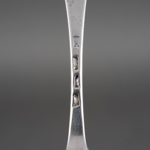 621 - A set of nine George II Hanoverian pattern table spoons, each reverse terminal engraved with a crest... 