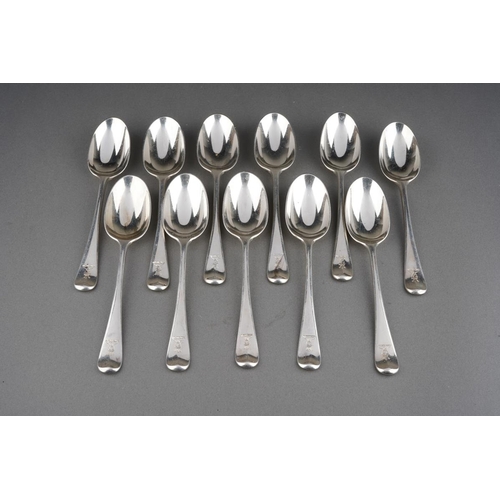 624 - A set of eleven Hanoverian Pattern silver dessert spoons, each engraved with a crest, by Tessiers Lt... 