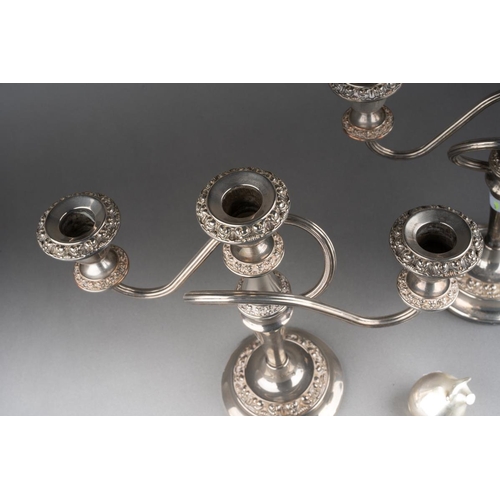 652 - A Dansk novelty pig silver plated paperweight, 5cm and a  pair of Victorian style silver three light... 