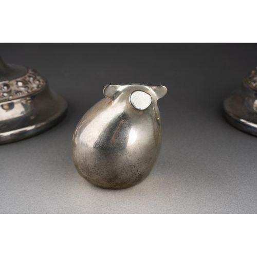 652 - A Dansk novelty pig silver plated paperweight, 5cm and a  pair of Victorian style silver three light... 