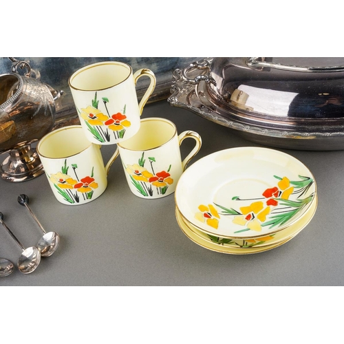 660 - An Art Deco EPNS three piece coffee set including small coffee pot [4 cup/can] with ratan handle, su... 