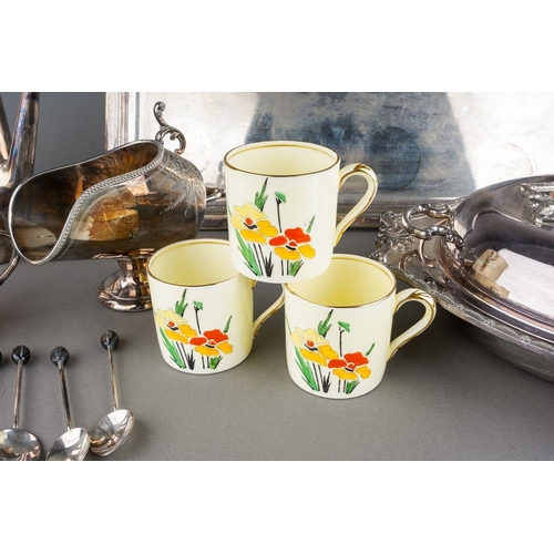 660 - An Art Deco EPNS three piece coffee set including small coffee pot [4 cup/can] with ratan handle, su... 