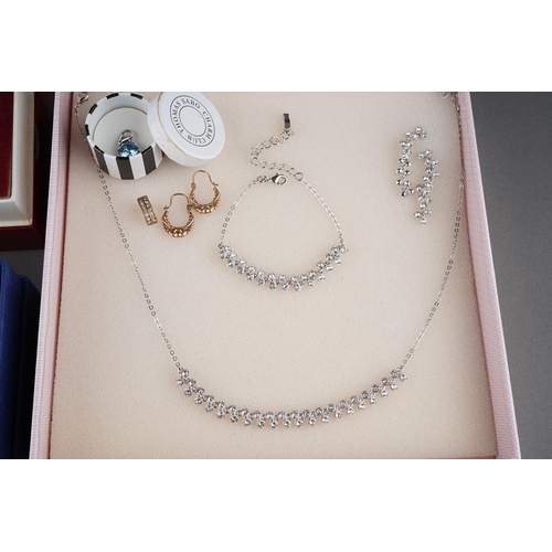 760 - Boxed Ted Baker set, Swarovski pendant and chain in a box, white metal ( marked 925) mounted earring... 