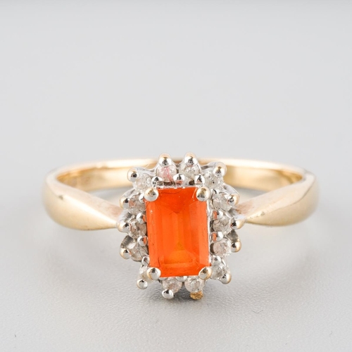 772 - A 9ct gold fire opal and diamond cluster ring. Hallmarked 9ct gold, approx ring size R, approx gross... 