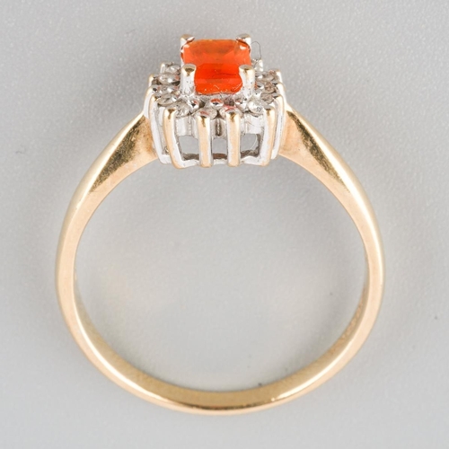 772 - A 9ct gold fire opal and diamond cluster ring. Hallmarked 9ct gold, approx ring size R, approx gross... 