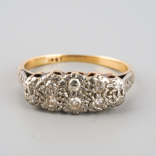 782 - A mid 20th century diamond ring. Stamped 18ct, approx ring size J, approx gross weight 2.6 grams.
