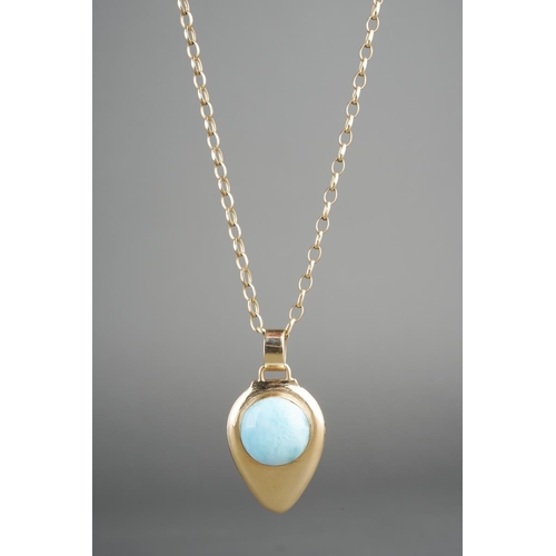 783 - A glass pendant and chain. Set with a glass cabochon, to the plain polished pendant with chain, pend... 
