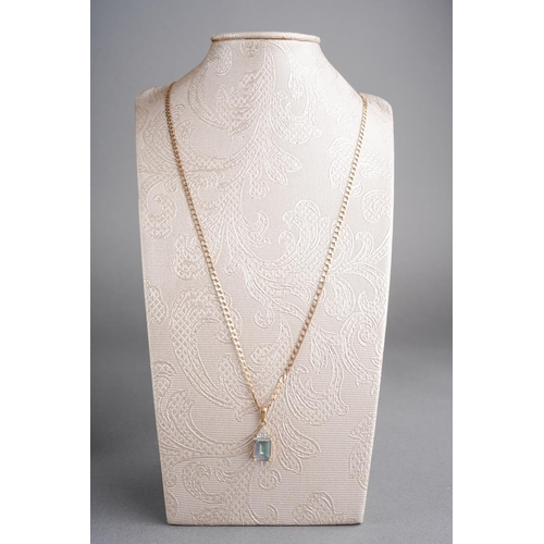 785 - A 9ct gold topaz and diamond pendant with chain. The coated topaz with diamond accent detail, hallma... 