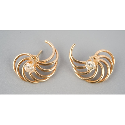 787 - A pair of diamond set ear studs, with accent detail. Unmarked, assessed as 9ct gold. approx gross we... 