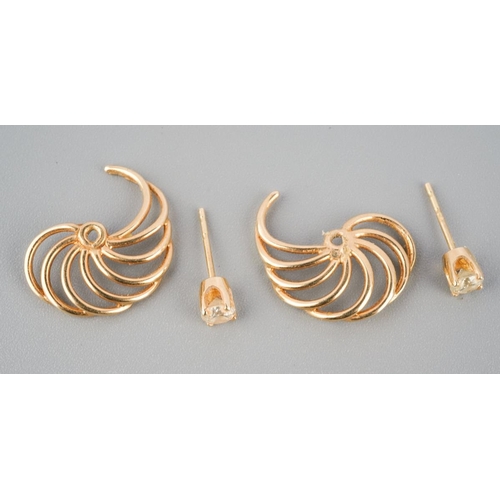 787 - A pair of diamond set ear studs, with accent detail. Unmarked, assessed as 9ct gold. approx gross we... 