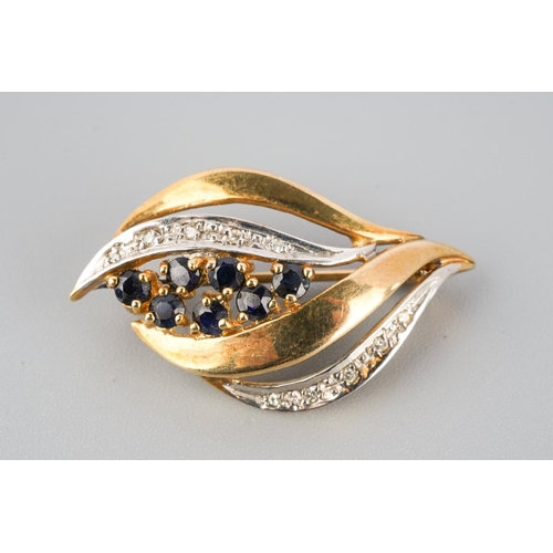 788 - A 9ct gold sapphire and diamond brooch. Hallmarked 9ct gold, approx length 30mm, appprox gross weigh... 