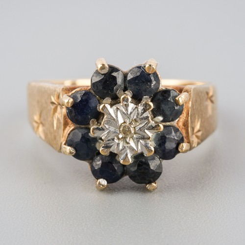 789 - A 9ct gold diamond and sapphire cluster ring. Hallmarked 9ct gold, approx ring size O, approx gross ... 