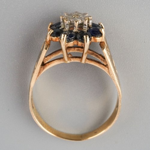 789 - A 9ct gold diamond and sapphire cluster ring. Hallmarked 9ct gold, approx ring size O, approx gross ... 