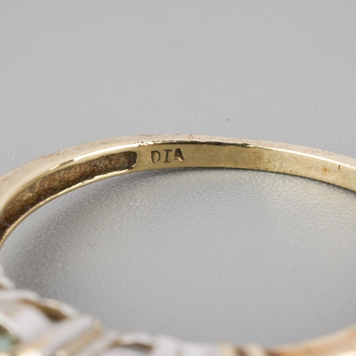 790 - A 9ct gold gem set and diamond ring. Hallmarked 9ct gold, approx ring size R 1/2, approx gross weigh... 