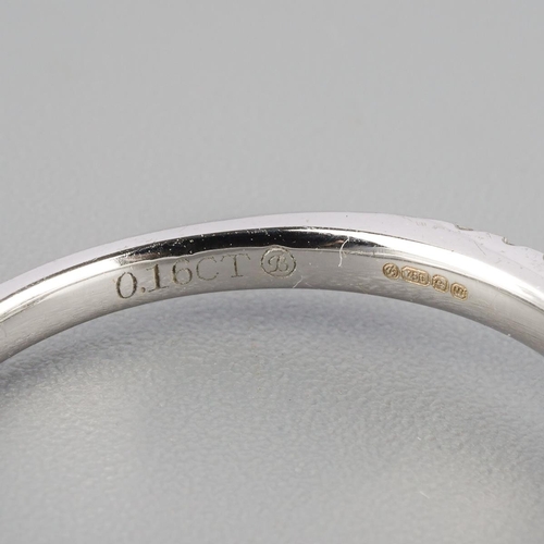 792 - An 18ct gold sapphire and diamond cluster ring. Hallmarked 18ct gold, sponsors mark Beaverbrooks, wi... 