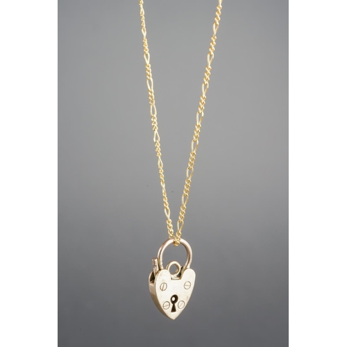 795 - Fine 9ct gold chain and a 9 ct gold heart shaped locket, lenght of the chain approx. 50 cm, combined... 