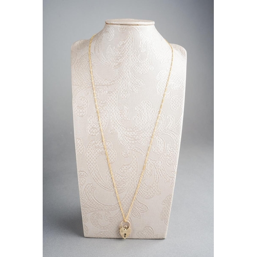 795 - Fine 9ct gold chain and a 9 ct gold heart shaped locket, lenght of the chain approx. 50 cm, combined... 